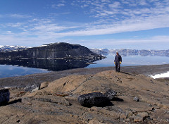 mountains of Baffin Island on horizon by subarcticmike remote island photo