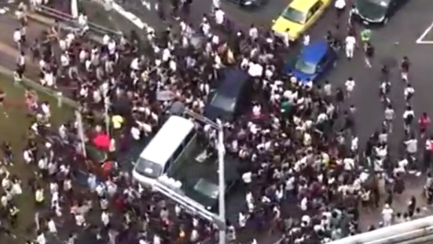 No, that's not an anti-Trump protest. Those are Pokemon Go! players.