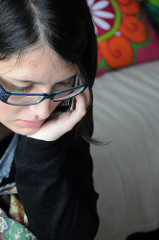 Cecilia on the phone by micboc talking on the phone photo